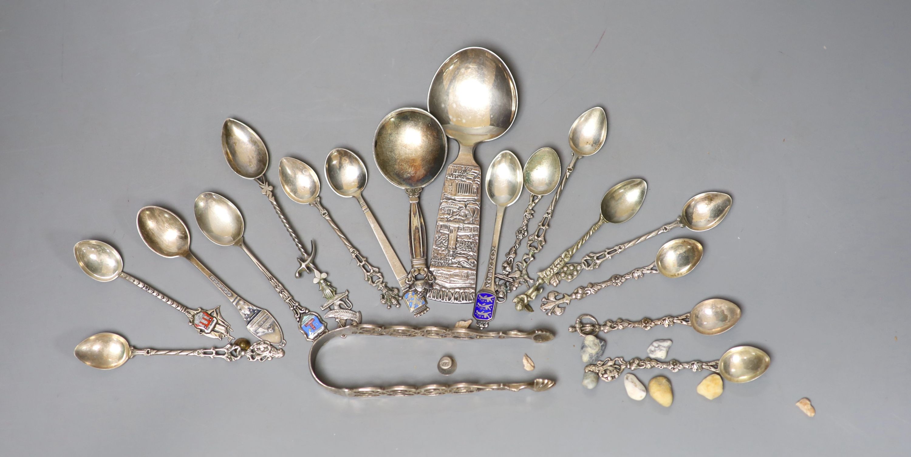 A Georg Jensen & Wendel A/S sterling small spoon, 10.2cm, a pair of antique silver sugar tongs(a.f.), a metal snuff box and a small group of minor spoons including continental white metal.